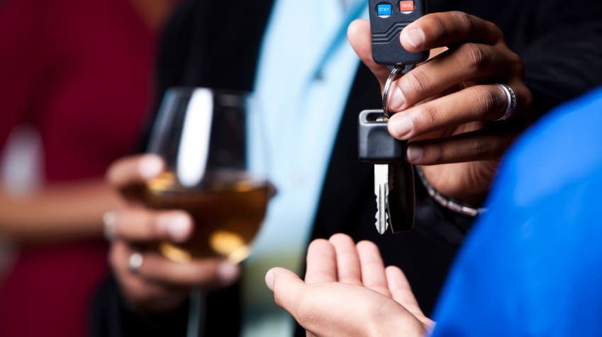 drunk man handing over car keys